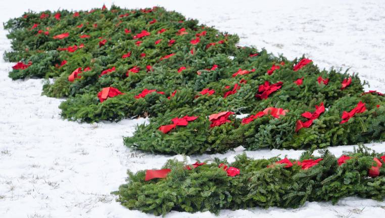 PHOTOS BY VERA OLINSKI Some of the over 200 wreaths which remember and honor those who served.
