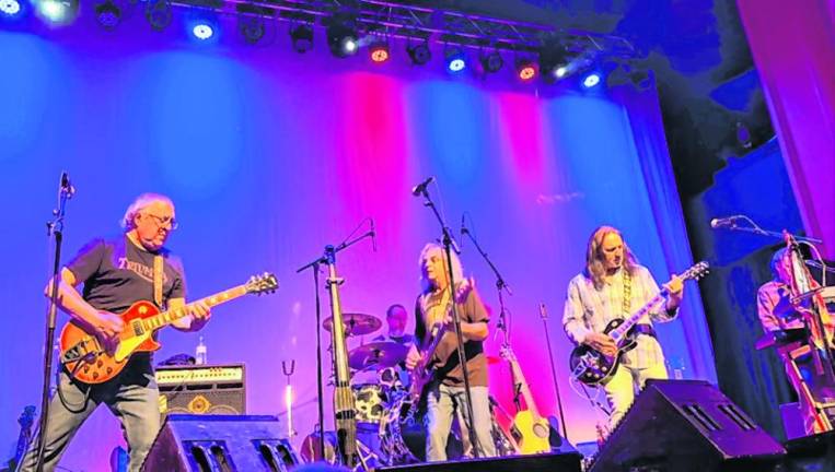 Tributes to rock stars, bands Sugar Mountain Band pays tribute to Neil Young on Saturday night at the Newton Theatre. (Photo courtesy of Sugar Mountain Band)