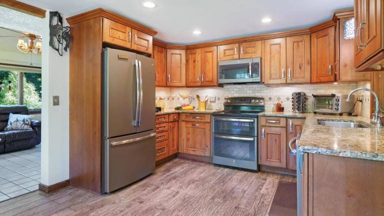 Secluded farmhouse on four acres comes with a green business