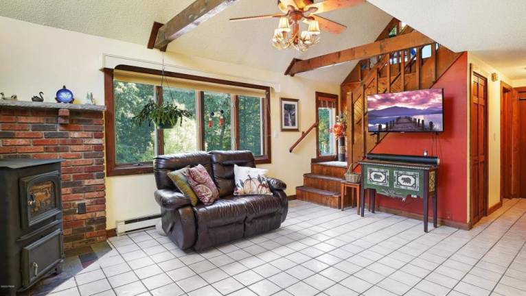Secluded farmhouse on four acres comes with a green business