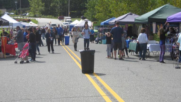 PHOTOS BY JANET REDYKE Main Street turns into the street fair on September 9