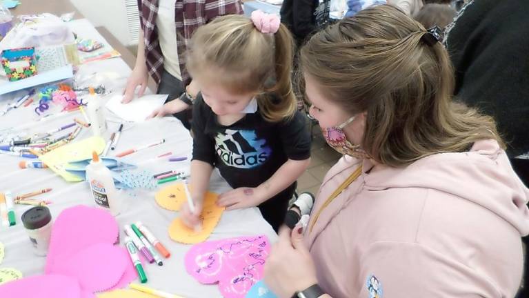 Students chill with friends at Cedar Mountain’s ‘Winter Wonderland’ Making Valentines (Photo provided)