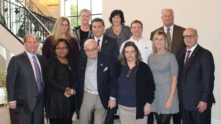 RoNetco honors longtime employees Front Row: David P. Romano (Vice President & CFO); Beverly Ruddock (Hopatcong); Dominick V. Romano (President & CEO); Karen Cordes (Hackettstown); Diane Critchley (Long Valley); Dominick J. Romano (Vice President & COO); 2nd Row: Inger Zabriskie (Washington); Jeff Baker (Hackettstown); Richard Michniewicz (Oxford); Hank Ramberger (Vice President & General Manager); 3rd Row: Cindy Golec (Netcong) and Martha Assante (Sussex)
