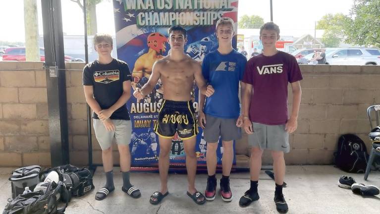 Teen kick boxer challenged by weightier opponents, emerges a champion Daniel Roque with his hometown fan base (Photo provided)
