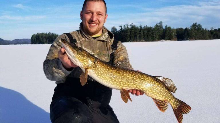 Anglers enjoy frigid temperatures and tranquility Anglers enjoy frigid temperatures and tranquility