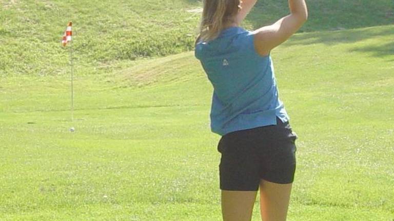 Never too hot for golf Never too hot for golf