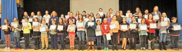 Students receive certificates at the Families Empowered Vernon Town Hall for participating in contests and attending an anti-bullying summit.