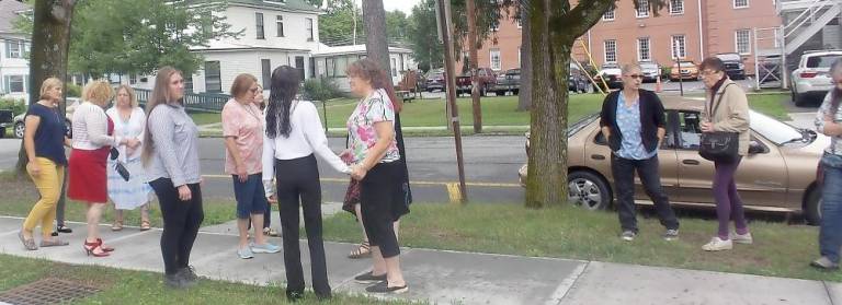 Court grants protection order to animal shelter worker Seventeen people turned out to support Selina McGinnis outside the Pike County Courthouse (Photo by Frances Ruth Harris)