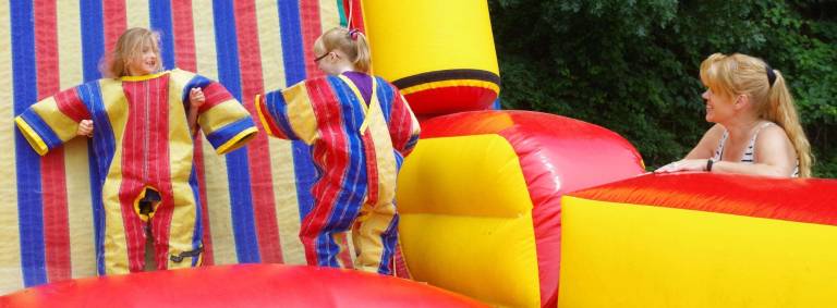 Parent volunteer Andrea Barnable of Barry Lakes kept a watchful eye on the children using the Velcro Wall. There were three inflatable attractions for the kids, plus a lot more.