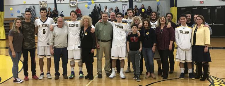 Vernon basketball honors seniors, top fan