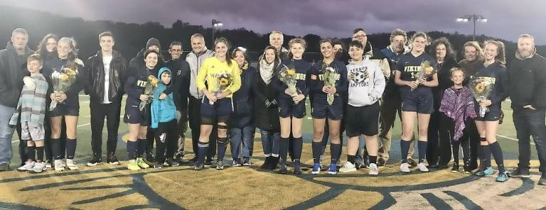 Seniors with family members.