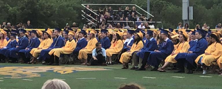 Vernon Township High School seniors listen during graduation ceremonies on Friday, June 22.