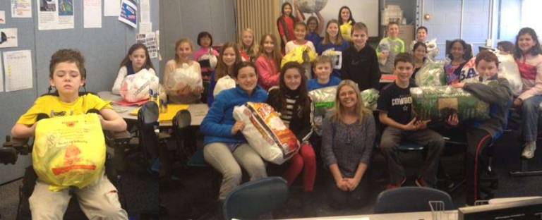 Helen Morgan Middle School students in Sparta are shown with recycling materials.