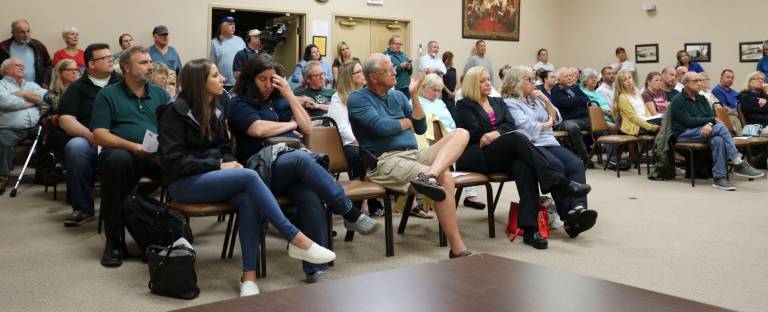 The public crowded the Vernon Township Municipal Center to discuss the township's sidewalks.