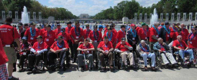 Vernon resident escorts veteran on Honor Flight A group shot.