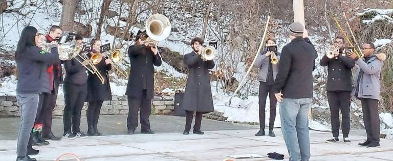 The Vernon Brass Ensemble took center stage first to play several Christmas songs.