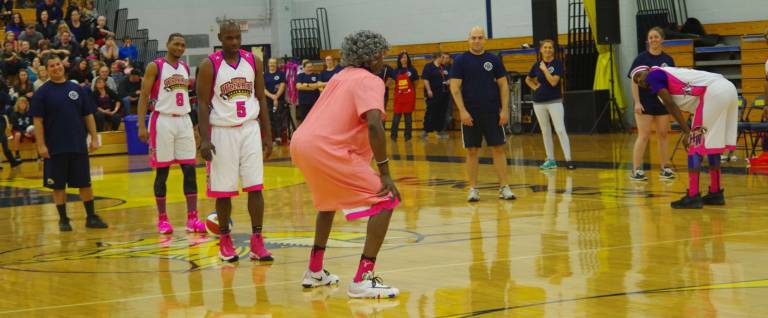 The Harlem Wizards are shown during their nearly nonstop hilarious antics during the game.