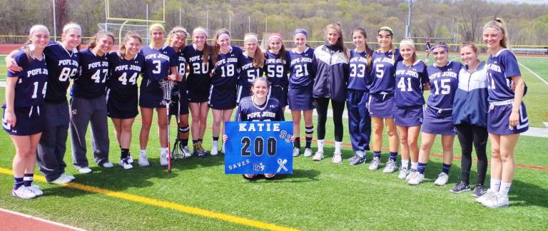 Callahan's 200th goal highlights Pope John win Pope John goal keeper Katie Callahan made five saves in the game including the 200th save of her career.