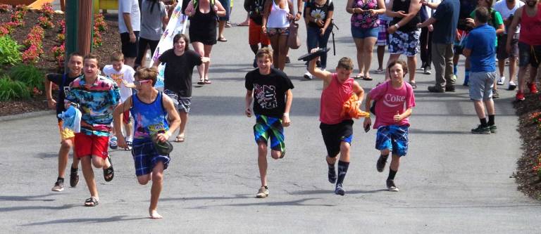 Even though the water was still on the cool side, there was a race up the hill to be the first ones on the rides. People waited at the entrance gates and when the 10:30 a.m. opening the season officially began.