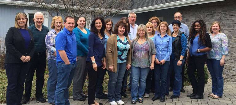 Shown above Franklin Mutual employees proudly don blue clothing at work in support of CASA.