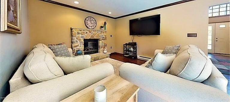 Modern two-story home has lake rights Fireplace