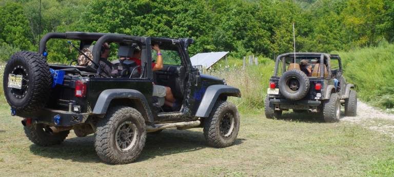 A caravan comprised of a few dozen Jeeps heads up the mountain in Hardyston.
