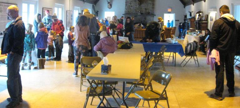 The High Point Interpretive Center is crowded with visitors celebrating winter.