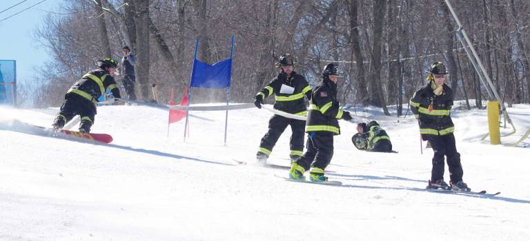 PHOTOS BY GEORGE LEROY HUNTER The Vernon Township Fire Department got off to a bad start losing a team member who fell.
