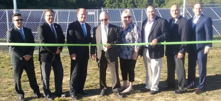 Pictured, from left, Ryan Scerbo of Decoitiis Law, Mark Werner of Gabel Associates, VTSD Assistant Superintendent Dr. Charles McKay, Business Administrator Steve Kepnes, VBOE Members Cynthia Auberger and Brad Sparta, Superintendent Arthur DiBenedetto and Nick Walsh of Solar City.