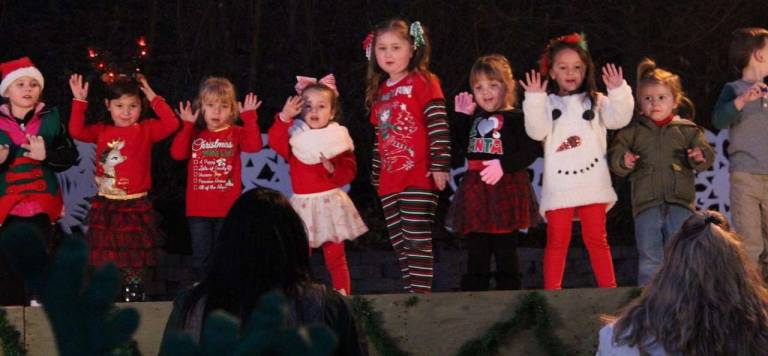 Ziegler Dance Center sponsors tree lighting Growing and Knowing Academy Singers
