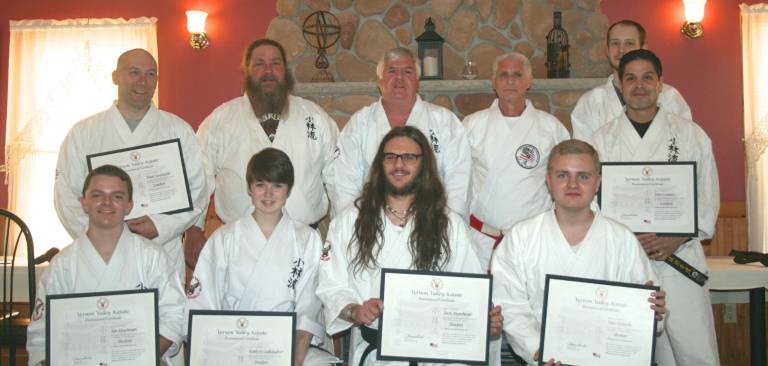 Vernon Valley Karate announces promotions Pictured from left are: in back, Paul Doumanis, Sensei Tim Duvelsdorf, Sensei Tom Shull, Sensei Chuck Ercolano, Sensei Barret Myzak, Jose Gomez; in front, Ian Houtman, Kaitlyn Gallaugher, Jack Marchioni, and Tyler Lohwin.