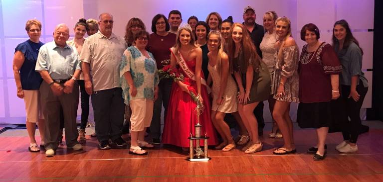 Mackenna Wallace is shown with family and friends.