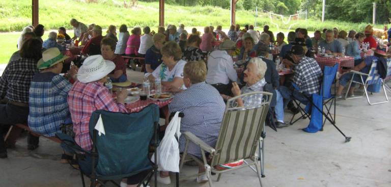 The sold out crowd enjoyed the country western flair and hoedown music by DJ Alan Boles.
