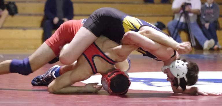 Vernon's Sultan DeStani is on top of Lenape Valley's Aaron Arzon in the 138 lbs weight class. DeStani won by pinning Arzon in 1:22.
