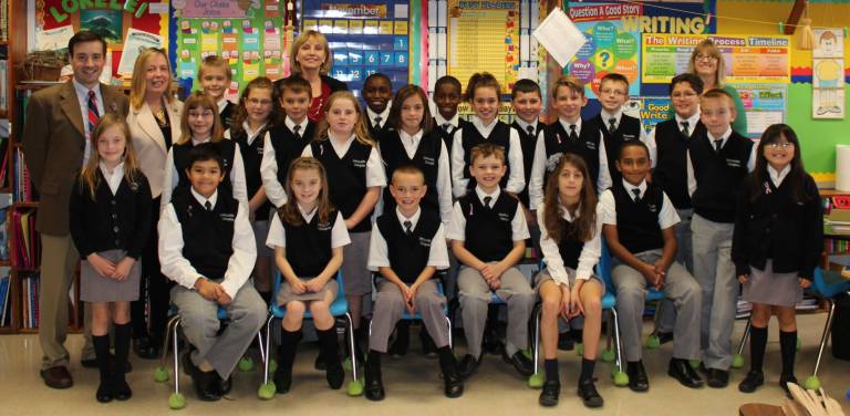 Lt. Governor Kim Guadagno, along with Assemblywoman Alison McHose, Principal Marc Valentine, fourth-grade teacher Patti Ayres with the Immaculate Conception fourth-grade class.