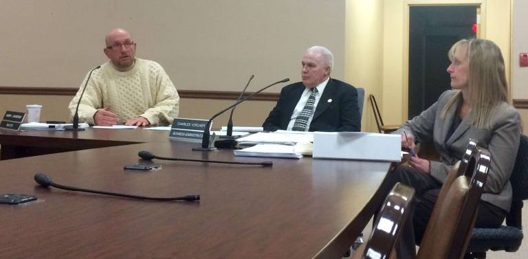 Photo by Diana Goovaerts Vernon Mayor Harry Shortway, addresses the Township Council during the introduction of the 2017 budget Monday, March 13. Business Administrator Charles Voelker, center, and CFO Elke Yetter are also pictured.