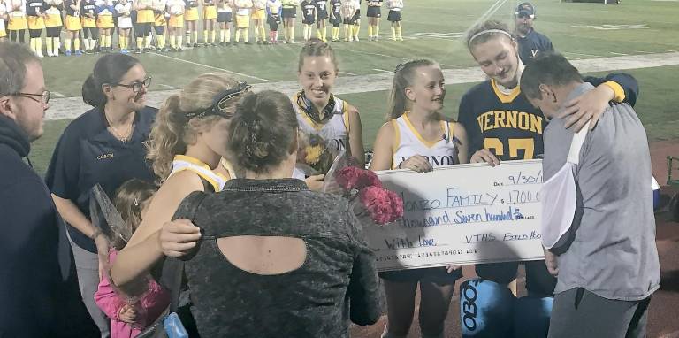 Vernon Field Hockey High School program uses the Youth Night to raise funds for a local Vernon Family in need. This year, the Monzo Family were recipients of the funds