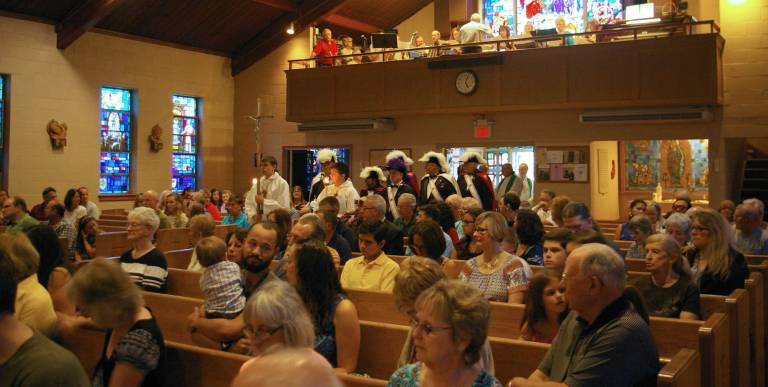Celebration in honor of Father Bob’s retirement Attendees from as far away as Pennsylvania filled Our Lady of Fatima Roman Catholic Church to celebrate the retirement of Father Bob.