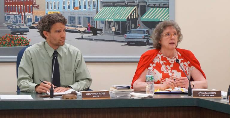 Photos by Vera Olinski Mayor Jonathan Rose, left, listens and Coucil President Linda Masson speaks during a recent council meeting.