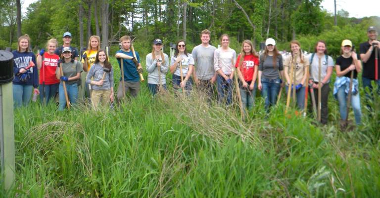 High Point class collaborates in tree planting High Point AP Environmental science class.