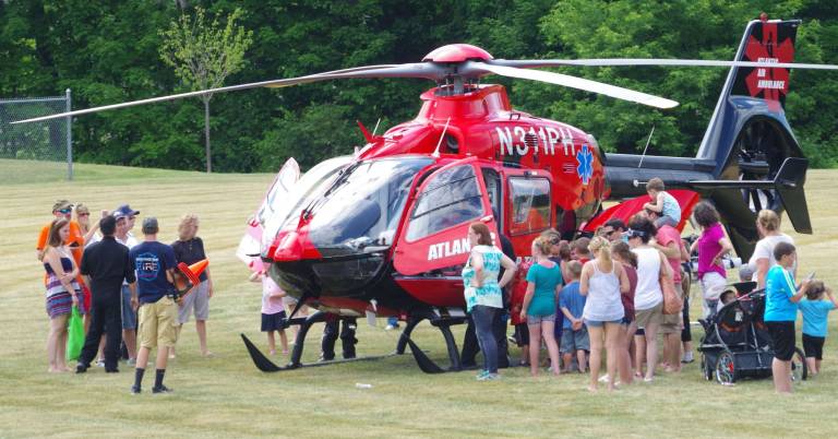 The highlight of the afternoon was when a helicopter from Atlantic Air Ambulance arrived. After it landed, residents were permitted to get a really good look at it.