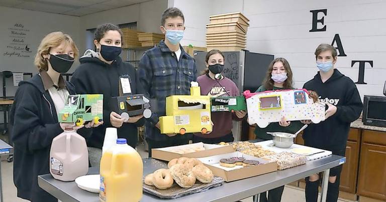 Pictured with their food truck replicas are, from left, Adrian Mead, Elizabeth Schamble, Dylan Bressler, Breanna Ianos, Kristen Nalbone, Kyle Meisenkothen.