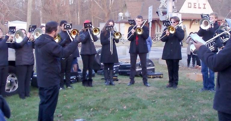 The Vernon Township High School Band entertained with Christmas Carols.