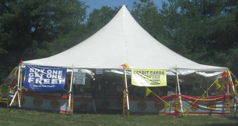 PHOTO BY JANET REDYKE A tent selling fireworks, some of which are now legal in New Jersey, set up on Route 94 in McAfee the weekend before July 4.