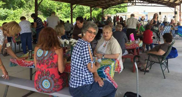 Senior Center hosts annual picnic The group enjoys the food.