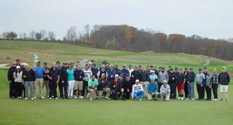 The 18th Annual Crystal Springs Employee Cup Teams pose for a photo on the 9th green prior to play.