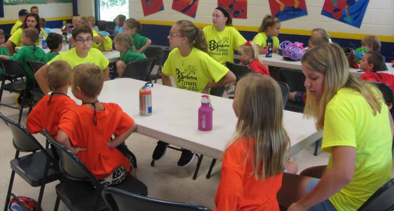 Upcoming kindergartners visit Safety Town Safety Towners and their big kid helpers await the next fun safety activity at the Vernon PAL.