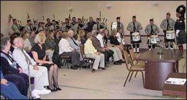 Two officers promoted, one retires Two officers promoted, one retires