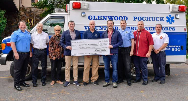 Robert Wiebel and PJ Wiebel of the Wiebel Family Foundation present a check for $6,000 to the Vernon First Responders including the Ambulance and Fire Squads.The Wiebel&#x2019;s are looking to make this a yearly event attracting other businesses and individuals to support the First Responders.