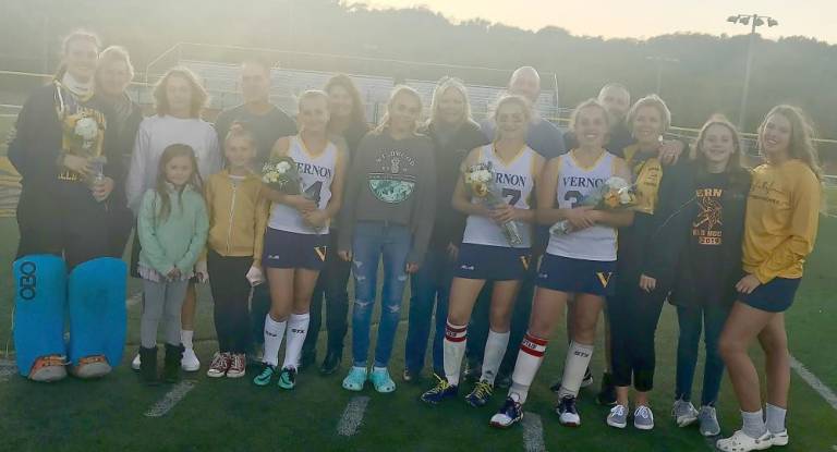 The seniors of the Vernon Township field hockey team is shown with their parents.